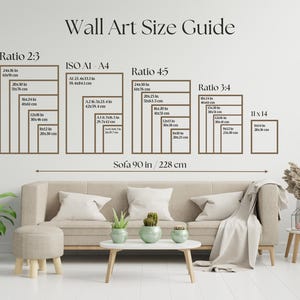 May include: A wall art size guide with different ratios and measurements in inches and centimeters. The guide shows the size of artwork that would look good above a 90-inch sofa.