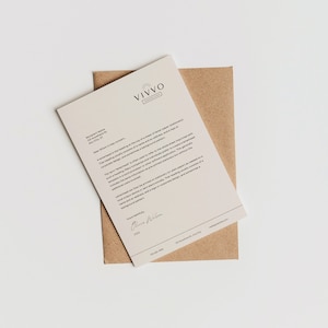 Membrete profesional elegante en blanco y negro / Plantilla editable en Canva