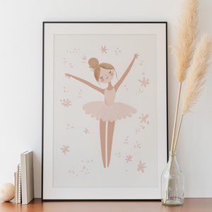 May include: A framed illustration of a ballerina in a pink tutu with her arms outstretched. The background is a light pink with small pink flowers and dots.