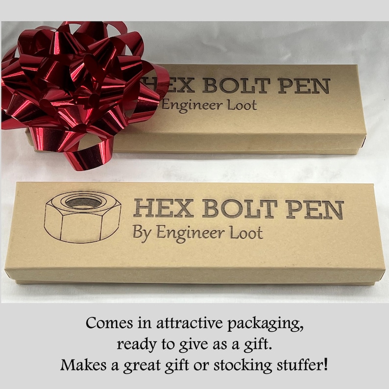 May include: A brown cardboard box with the text "HEX BOLT PEN By Engineer Loot" printed on it. The box is wrapped in red ribbon and is ready to be given as a gift.