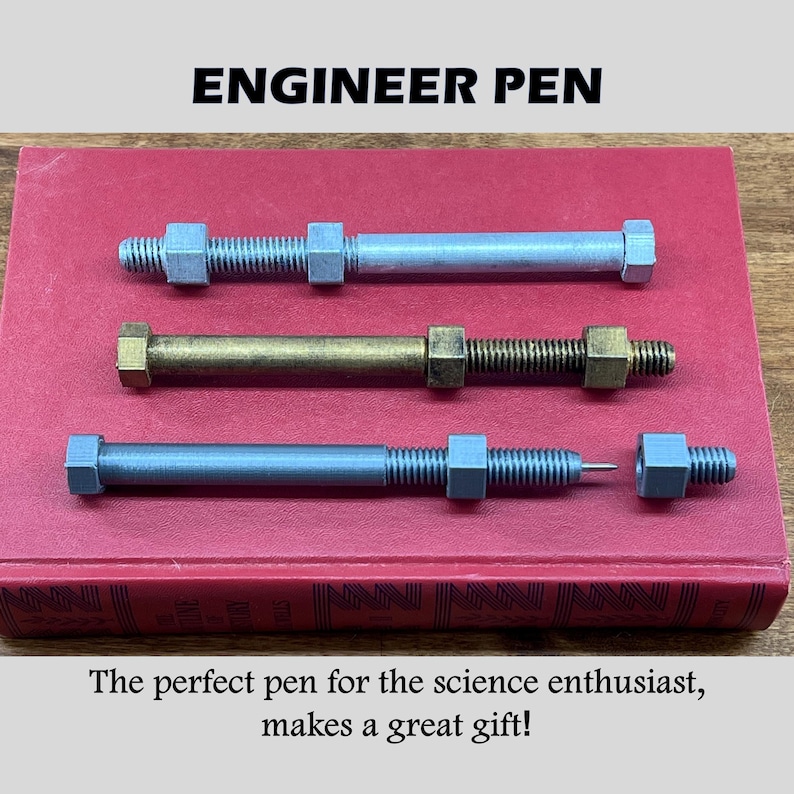 May include: Three silver, brass, and gray metal pens shaped like bolts with nuts on each end. The pens are on a red book with the text "ENGINEER PEN" above them and the text "The perfect pen for the science enthusiast, makes a great gift!" below them.
