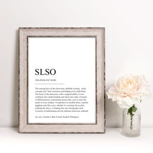 May include: A black and white printable definition of the word "SLSO" which stands for "School Liaison Support Officer". The definition describes the role as the unsung hero of the classroom, skillfully turning tricky concepts into "aha" moments and helping every child shine.
