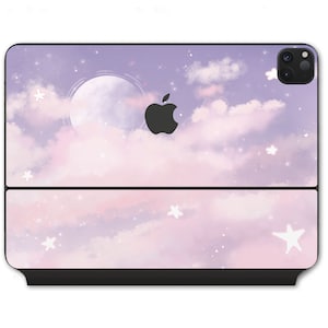 May include: A purple and pink phone case with a cloud and moon design. The case features a white apple logo and white stars.