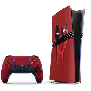 May include: A red and black PlayStation 5 console with a custom design featuring a black and white graphic. The console is shown with a matching red and black controller.