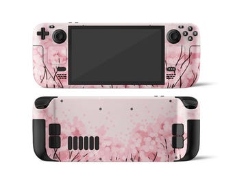 May include: A handheld gaming console with a pink floral design. The front features a black screen, buttons, and control sticks. The back of the console also has the same pink floral pattern and black accents.