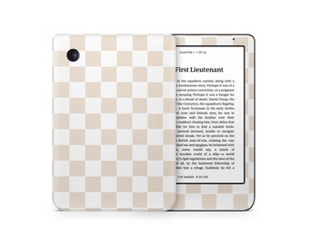 May include: A white and beige checkered Kindle e-reader with a black screen displaying the text "First Lieutenant" and the beginning of a story. The text on the screen reads: "In the squadron carried, along with a burdensome story. Perhaps it was of a secret prison conviction, or a pregnant weeping. Perhaps it was a hunger for or a dread of death. David Cheap, the ..."
