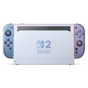 Può includere: Una console di gioco Nintendo Switch nella sua docking station. La console ha uno schermo viola chiaro ed è affiancata da controller blu e viola. La docking station è bianca con il logo Nintendo Switch in blu e viola.