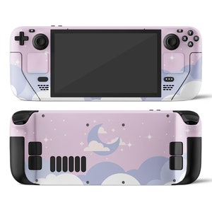 May include: A pink and white handheld gaming console with a moon and clouds design. The console has a black screen and black buttons.