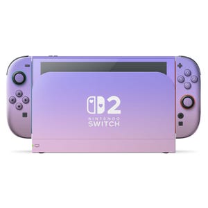 May include: A Nintendo Switch console in a gradient of purple and pink. The console has two detachable controllers, one on each side, and a central screen. The Nintendo Switch logo is visible on the front.