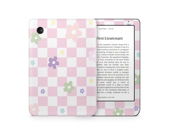 May include: A pink and white checkered Kindle Paperwhite e-reader with a floral pattern. The screen displays the text "First Lieutenant" and "CHAPTER 1 - 1 OF 24".