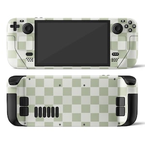 Puede incluir: Consola de juegos portátil con un patrón de tablero de ajedrez en verde claro y blanco. La consola tiene una pantalla negra, botones y joysticks. La imagen muestra la parte delantera y trasera del dispositivo.