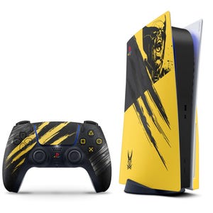May include: A yellow and black gaming console and matching wireless controller featuring a graphic of a character with a mask and claw marks. The console has a vertical design with a black center and yellow side panels, while the controller has black grips and yellow accents.