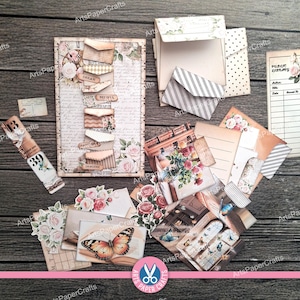 May include: A collection of vintage-style paper ephemera, including envelopes, tags, and cards. The designs feature floral motifs, butterflies, and handwritten script. The color palette includes soft pinks, creams, and browns, creating a romantic and nostalgic feel.
