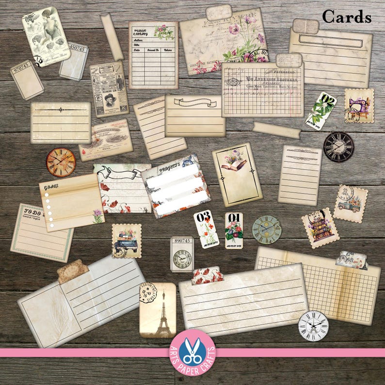 May include: A collection of vintage-style paper ephemera including lined index cards, ledger sheets, postcards, and small tags. The items feature floral illustrations, clock motifs, and text labels like Cards, Goals, and To Do, arranged on a wood surface.