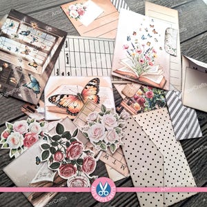 May include: A collection of paper ephemera featuring floral and butterfly illustrations. Includes images of roses, butterflies, open books, and vintage-style envelopes. The color palette is soft, with pinks, creams, and touches of blue.