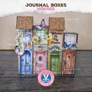 May include: Four rectangular paper journal boxes designed as houses with tiled roofs, colorful doors, and floral accents. The boxes feature butterflies, potted plants, and the text Welcome To My Dream. The top of the image displays the text JOURNAL BOXES HOUSES.