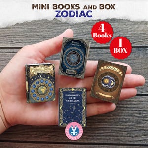 May include: A set of four miniature books titled The Celestial Zodiac, Whispers of the Cosmos, The Horoscopes of the Zodiac Signs, and Zodiac. The covers feature intricate celestial illustrations, star charts, and gold-toned accents.