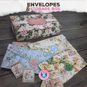 May include: Floral-patterned storage box and envelopes. The box and envelopes feature a vintage floral design with pink, white, and green flowers. Several envelopes are displayed with wax seals and postage stamps. The text "ENVELOPES & STORAGE BOX" is at the top.