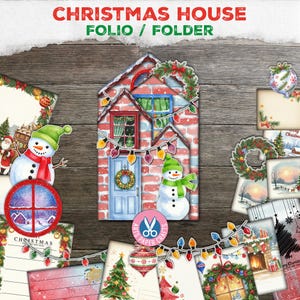 May include: A Christmas house folio folder kit featuring a red brick house illustration with a blue door, a snowman, and string lights. The set includes various decorative paper elements like wreaths, ornaments, and winter scenes with snow.