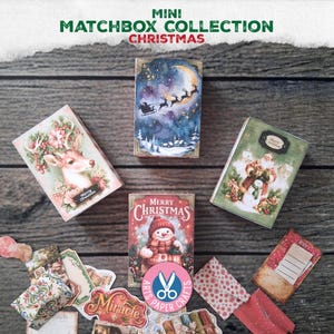 May include: A collection of four rectangular mini matchboxes featuring Christmas illustrations, including a reindeer, a night sky with Santa's sleigh, a snowman, and a festive scene. The text MINI MATCHBOX COLLECTION CHRISTMAS is visible.