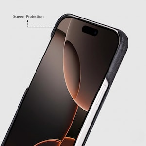 May include: Close-up of a black smartphone with a protective case. The case has a textured appearance and wraps around the phone's edges. The screen displays a dark, abstract design. The words "Screen Protection" are visible.
