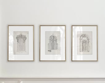 May include: Three framed black and white architectural drawings of ornate doorways. The drawings are in a minimalist style and feature intricate details.