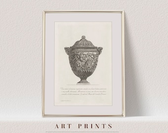 May include: A black and white antique illustration of a decorative urn with intricate carvings. The urn is depicted against a white background. The text below the image reads: "This vase is of ancient Roman manufacture, and is said to have been found among the ruins of the villa of Hadrian, near Tivoli. It was in the possession of the celebrated antiquary, Count de Caylus, and is now in the Museum of the Louvre, Paris."