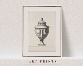 Peut inclure: Impression d'art encadrée présentant une illustration détaillée d'une urne classique avec couvercle. L'urne est représentée en niveaux de gris avec un corps cannelé et des détails ornés. Le texte "ART PRINTS" et "ANTIQUE ART COLLECTIVE" est en bas.