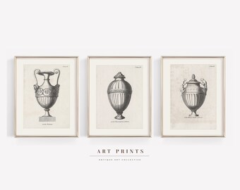 May include: Three black and white antique art prints of ornate urns in frames. The prints are on a white background.