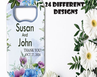 May include: A blue and purple floral design wedding bottle opener magnet with the text "Susan and John" and "Thank You! Oct 27, 2024".