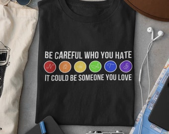 Be careful who you hate. It could be someone you love. Unisex Heavy Cotton T-Shirt