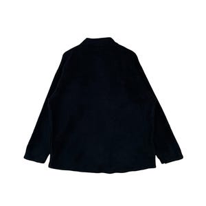 May include: A black long-sleeved jacket with a zipper closure.