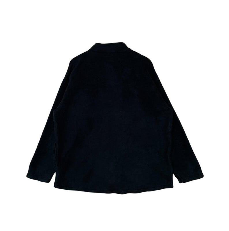 May include: A black long-sleeved jacket with a zipper closure.