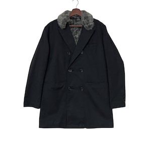 May include: A black double-breasted coat with a faux fur collar.