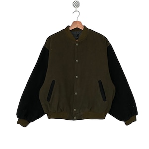 May include: A green and black varsity jacket with a button closure. The jacket has a ribbed collar, cuffs, and waistband.