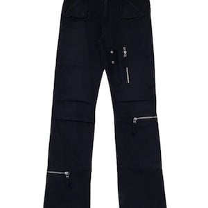 May include: Black cargo pants with multiple zippered pockets and a straight leg fit.