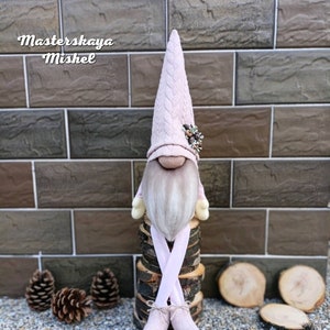 Scandinavian gnome with handing legs
