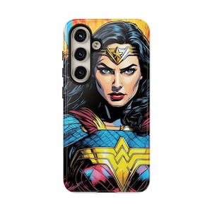 May include: A phone case featuring a colorful illustration of Wonder Woman, a superheroine with a red, blue, and yellow costume. Her face is visible, and she is looking directly at the viewer. The case has a cutout for the phone's camera.