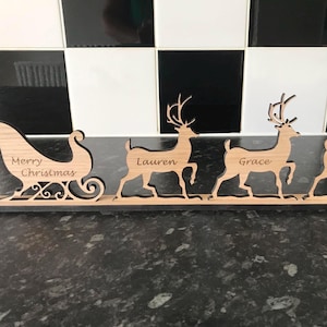 Personalised Engraved Wooden Christmas Decoration Santa Sleigh With Reindeers