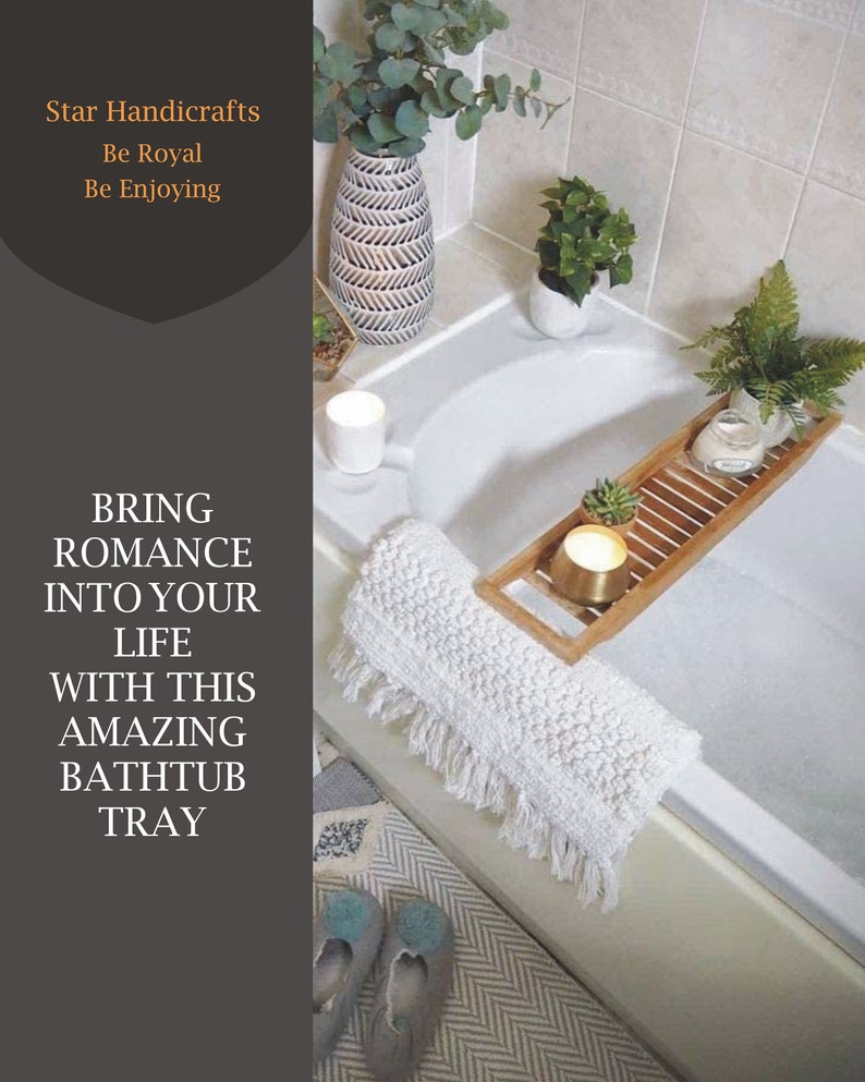 May include: A white bathtub with a wooden tray holding a candle, succulent, and fern. A rolled white bath mat with fringe sits on the tub's edge. The text on the left says, "BRING ROMANCE INTO YOUR LIFE WITH THIS AMAZING BATHTUB TRAY."