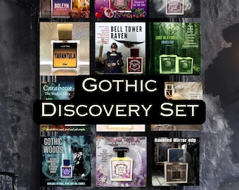 May include: A collection of twelve perfume samples titled Gothic Discovery Set, featuring various glass bottles with labels such as Boleyn, Fruits from the Ebony Forest, Ghost Cat, Tarantula, Bell Tower Raven, Lost in a Forest, Gothic Woods, and Haunted Mirror.