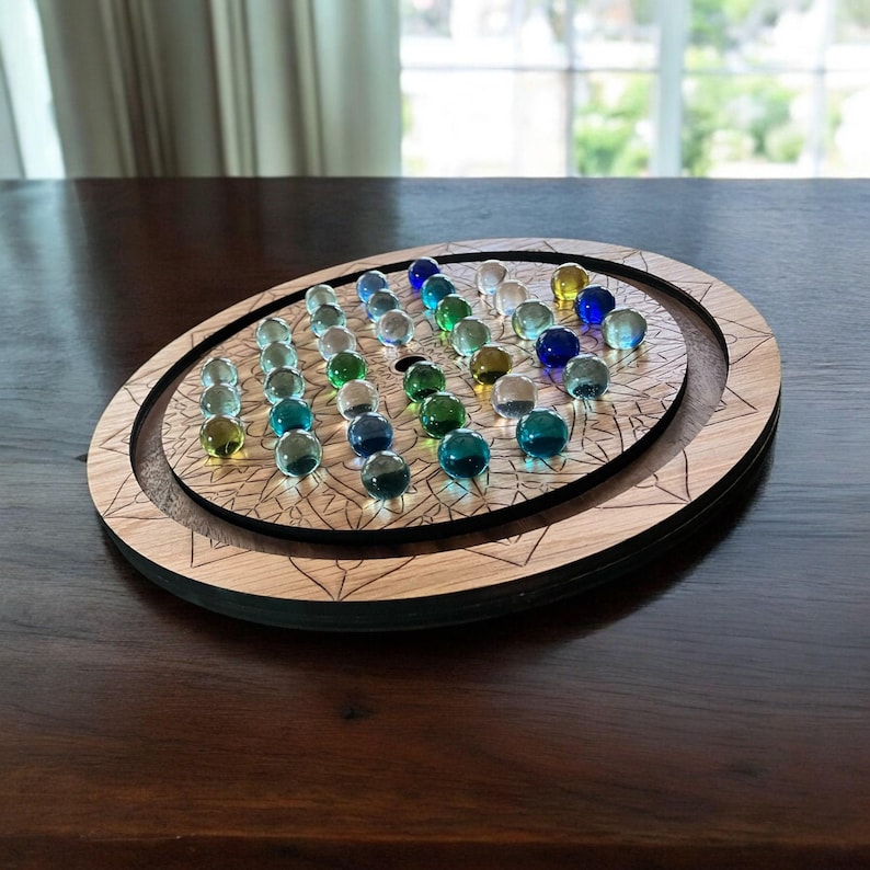 Wooden Board Game Marble Solitaire Perfect Gift Men Dad Birthday Present Heirloom Quality Handcrafted Design Glass Marbles Blue Green Shades Oak Walnut Wood Options Coffee Table Display Piece Strategy Challenge One Player Entertainment