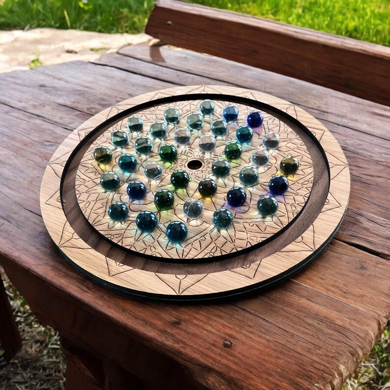 Handcrafted Wooden Game Board Marble Solitaire Luxury Set Glass Marbles Blue Green Shades Premium Oak Walnut Wood Construction Laser Engraved Venetian Pattern Perfect Gift Dad Men Birthday Present Coffee Table Display Strategy Challenge One