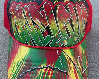 One Love Red Trucker Hat Spray Paint Artwork One Of A Kind Rasta Style Cap Pot Leaf Marijuana Theme Painting Yellow Green Black