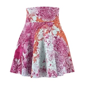 May include: A pink, orange, and white skater skirt with a marbled pattern.