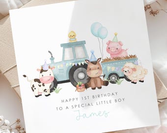 May include: A white card with a blue tractor, a cow, a horse, a pig, and a sheep. The card says "Happy 1st Birthday to a special little boy James".