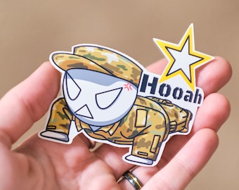 May include: A cartoon character wearing a camouflage uniform and a hat, holding a star and the word "Hooah!" in a speech bubble. The character is in a push-up position.