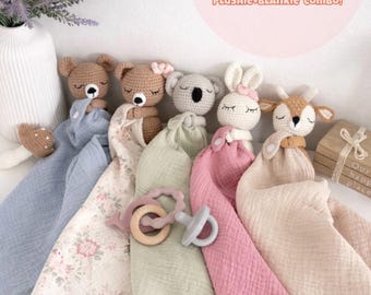 May include: Five baby lovey blankets with crocheted animal heads including a bear, koala, bunny, and deer. The blankets are 14"x14" muslin cotton with bell rattles inside. Text reads: BABY LOVEY 14"X14" BLANKIE; (WASHCLOTH SIZE) 100% MUSLIN COTTON; BELL RATTLE INSIDE; CHOOSE ANY PLUSHIE+BLANKIE COMBO!