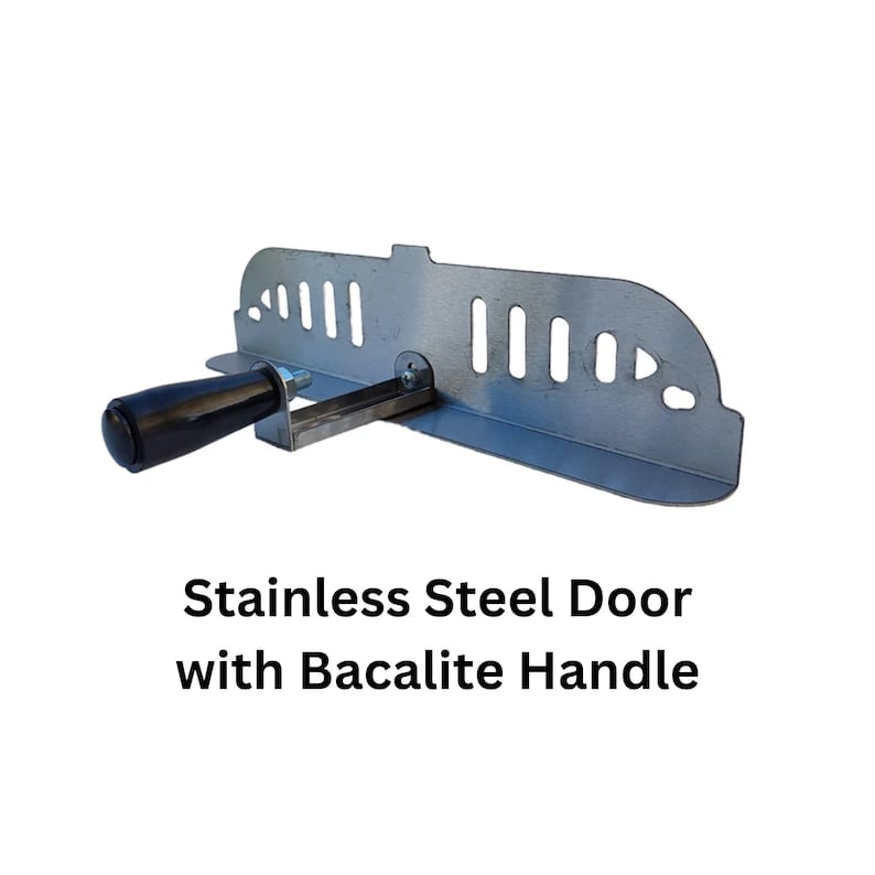 May include: Stainless steel door with a black bacalite handle. The door is made of stainless steel and has several vertical slots cut into it. The handle is cylindrical and attached to a metal arm.