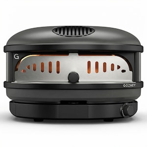 May include: A black outdoor pizza oven with a stainless steel interior. The oven has a rounded top with a vent and a control knob on the side. The brand name "GOZNEY" is visible on the front.